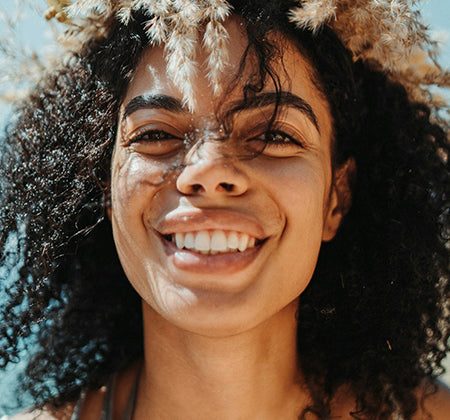 Woman with white teeth smiling